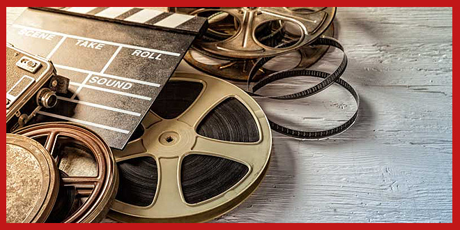 Film Reel, Clapper Slate and 8mm Film Camera